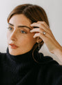 Lunette Lab-Grown Pear Shape Diamond Bezel Set Drop Pear Earring in Gold on model