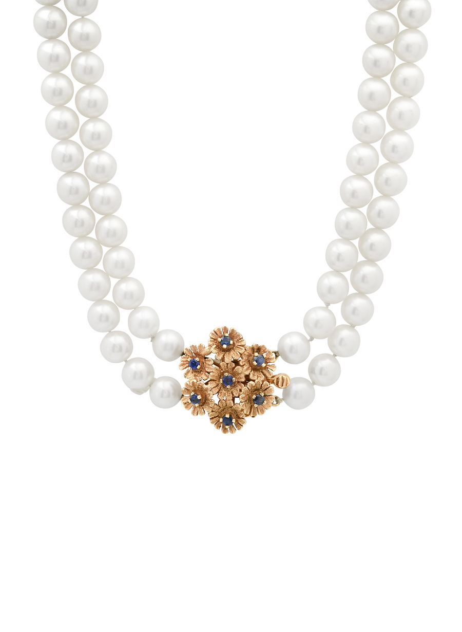 Vintage double-strand pearl necklace with a floral sapphire clasp, circa 1950s-60s